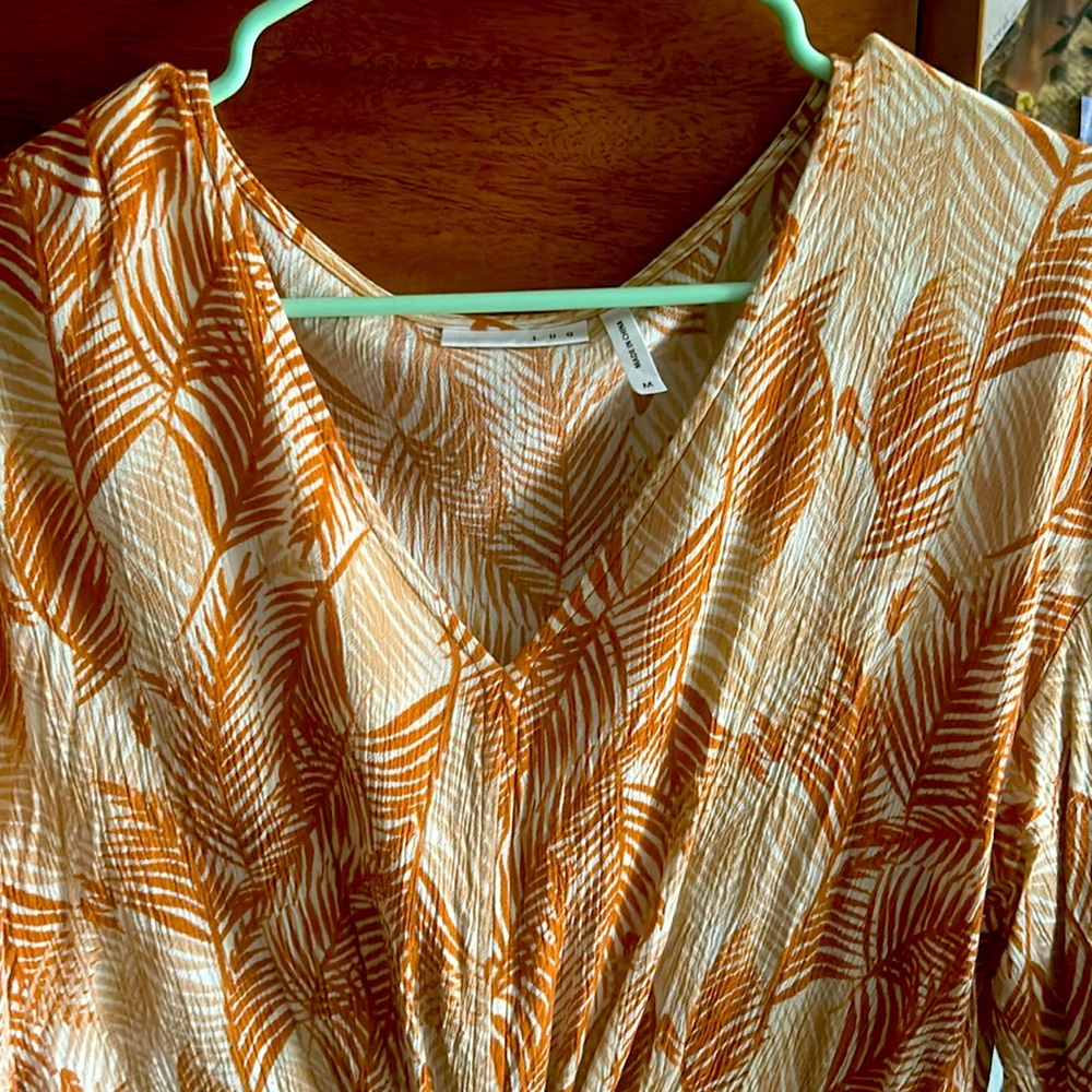 Short sleeve tie front blouse.
